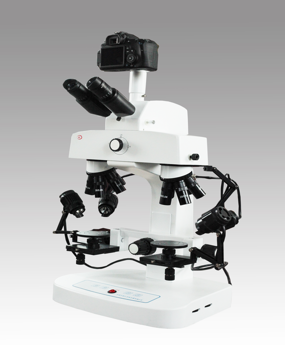 采用五孔物镜转换器，固定倍率变倍，转换器为停滞设计，操作可靠明显；保留左右工作台联动功能、通过触摸开关控制仪器。仪器造型美观、结构合理、操作可靠、便捷，符合人体工程学原理，其主要技术性能达到国内先进水平。
